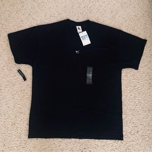 Nike Loose Fit Black Short-Sleeve Tee with Small White Swoosh
